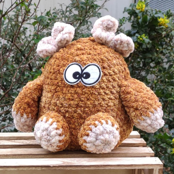 peluche gros monstre or