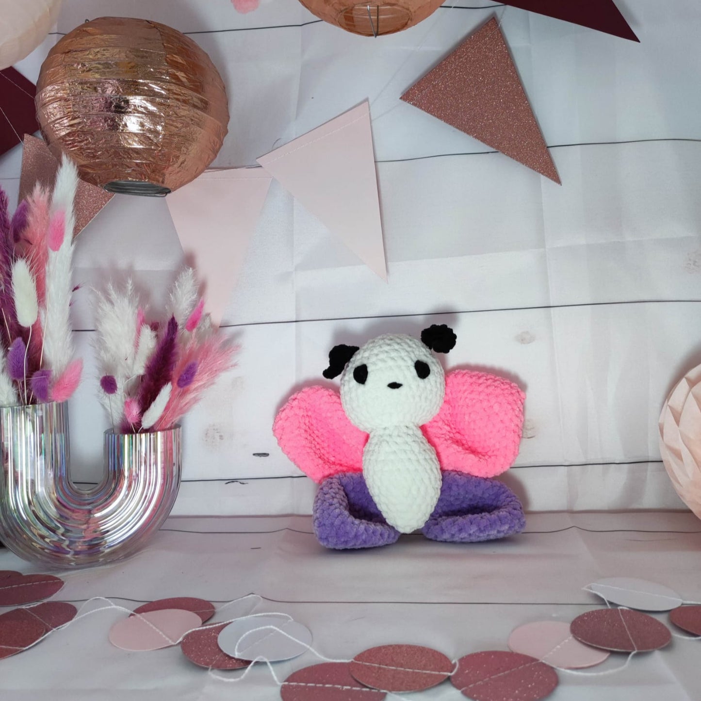 peluche papillon rose