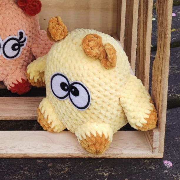 peluche petit monstre jaune