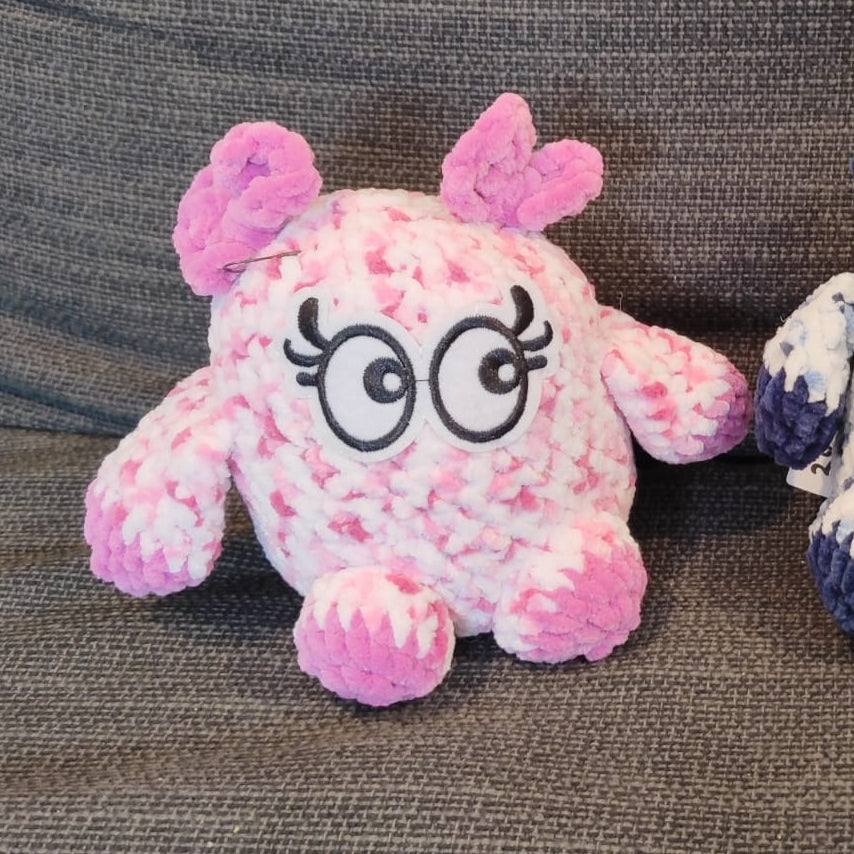 peluche petit monstre rose/blanc