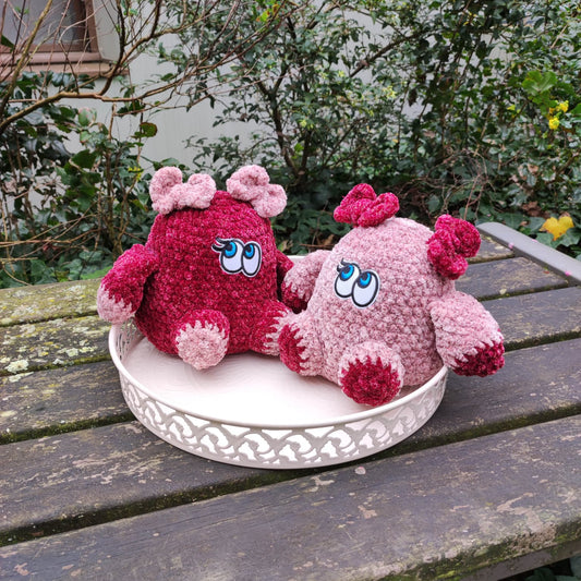 peluches gros monstres roses