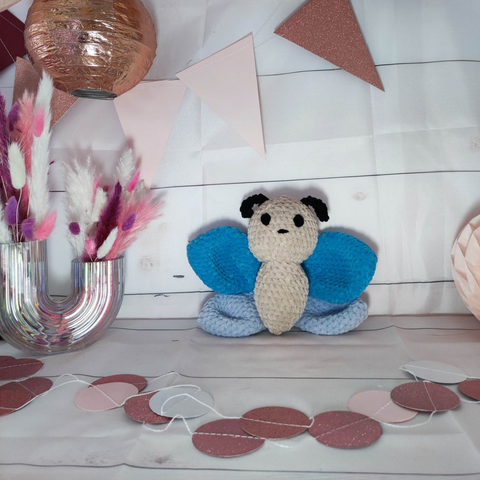 peluche papillon bleu