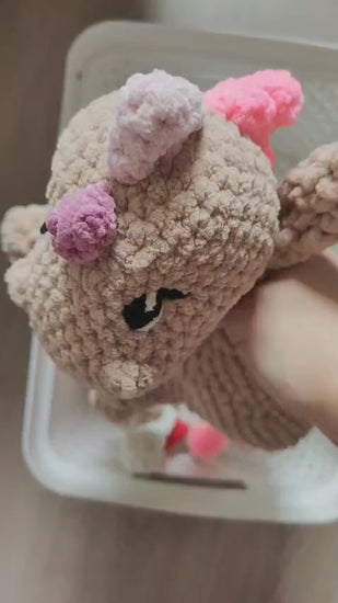 Gros doudou dino beige foncé